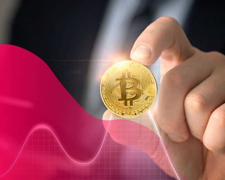 mano sosteniendo una criptomoneda Bitcoin